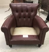 A modern buttoned leather upholstered sc