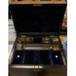 A Victorian burr walnut and mother of pearl inlaid travelling vanity case,