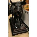 A Portuguese treacle glazed spirit dispenser as a bull by E H & Fra...