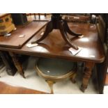 A Victorian mahogany rounded rectangular extending dining table,