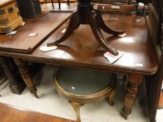 A Victorian mahogany rounded rectangular extending dining table,