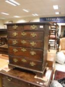 An 18th Century elm and walnut chest of small proportions,