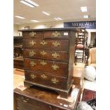 An 18th Century elm and walnut chest of small proportions,