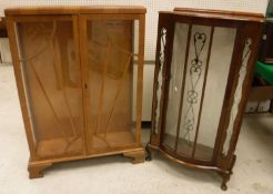 A modern mahogany bureau de dame with three drawer two door superstructure over two frieze drawers