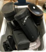 A box containing various binoculars including Paramount 8 x 25, Tohyoh 8 x 30, Tronic 8 x -24 x 50,