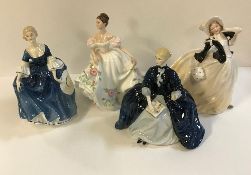 A collection of Royal Doulton figures comprising "Autumn Breezes" (HN2147), "Lucy" (HN3653),