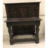 An oak court cupboard in the 17th Century style,