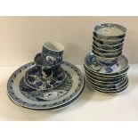 A collection of Chinese blue and white porcelain to include three baluster shaped vases with birds