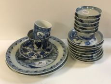 A collection of Chinese blue and white porcelain to include three baluster shaped vases with birds