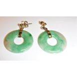 A pair of modern jade and yellow metal mounted disc earrings - diameter of disc approx. 2.