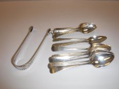 A collection of eight 19th Century silver bright cut teaspoons,