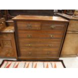 A late Victorian walnut chest,