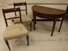 A Regency mahogany side table of demi-lune form,