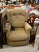 A modern electric reclining arm chair and two table lamps CONDITION REPORTS N.B.