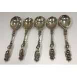 A set of three 19th Century cast white metal spoons,