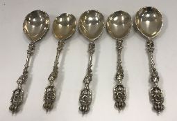 A set of three 19th Century cast white metal spoons,