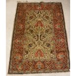 A Caucasian rug, the central panel set with floral design on a neutral ground,