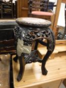 A 19th Century Chinese carved hardwood jardiniere stand,