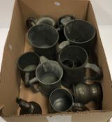 A collection of various mainly 19th Century pewter mugs and measures (10) and a pair of pewter open