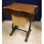 A Victorian burr walnut and marquetry inlaid serpentine fronted work table,