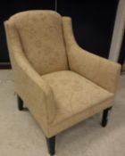 A circa 1900 upholstered shallow swept arm chair on square tapered front legs 60 cm wide x 83.
