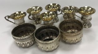 A set of six 19th Century Dutch silver tot mugs with gilt-washed interiors,