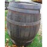 An iron-bound coopered oak barrel,