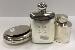 An Edwardian silver hip flask engraved “G.F.B from E.G.