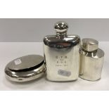 An Edwardian silver hip flask engraved “G.F.B from E.G.