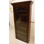 A Victorian mahogany bookcase cabinet of slim proportions,
