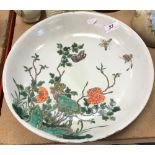 A 19th Century Chinese famille-verte circular dish with blossoming foliage and butterfly decoration,