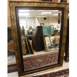 A pair of modern gilt framed rectangular wall mirrors with bevel edged plates 80 cm x 110.