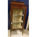 An Edwardian mahogany and leaded glazed single door display cabinet on square splayed supports,