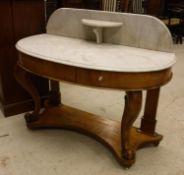 A Victorian marble top duchess washstand of demi-lune form 119 cm wide,
