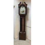 An 18th Century oak cased long case clock,