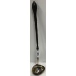 A George II silver punch ladle with shallow lip and turned wooden handle (by John Gamon,