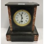 A late 19th Century French black marble and rosso marble cased mantel clock,