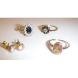 A 9 carat gold sapphire and diamond ring, size Q, a 9 carat gold sapphire and zircon ring, size N,