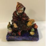 A Royal Doulton figure "The Potter" (HN1493) CONDITION REPORTS Appears to be in good