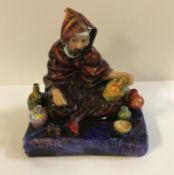 A Royal Doulton figure "The Potter" (HN1493) CONDITION REPORTS Appears to be in good