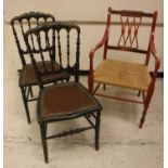 A pair of Victorian black lacquered and gilt decorated spindle back salon chairs on turned legs