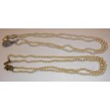 Two twin strand necklaces, one with simulated diamond clasp, 46 cm long,