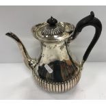 A Victorian silver coffee pot of pear form with semi-reeded decoration (by Martin Hall & Co,
