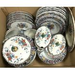A box containing a Poterat Wedgwood part dinner service to include tureens, soup bowls, etc,