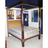 A mahogany framed full tester bedstead, with reeded and carved end posts, mattress,