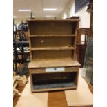 A child's stained and painted pine dresser with two tier boarded plate rack over a single drawer