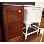 A Victorian mahogany pot cupboard, the single door enclosing a single shelf on a plinth base,