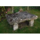 A large natural stone rectangular platform ( or sacrificial altar?),