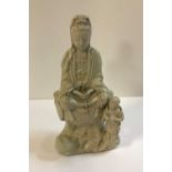 WITHDRAWN A Chinese blanc de chine figure of Guan Yin with attendant,