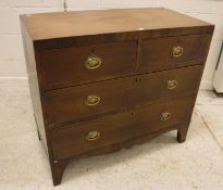 An early 19th Century mahogany square front chest,